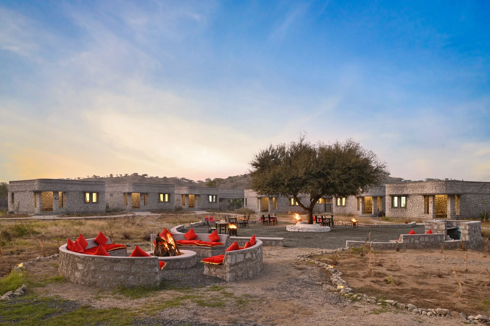 Located in the center of Jawai Bandh, J Wild Jawai is a five-star villa resort with a private pool surrounded by Aravalli rocky hills and greenery and wildlife. This boutique resort, conceived in 2019 through Mr. Kuldeep’s vision, introduces “Spline Architecture” – villas constructed from stone which melt into the landscape.